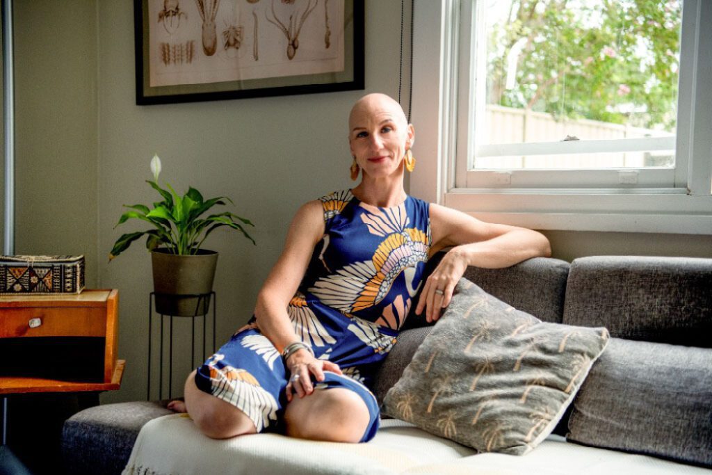 Author & Australian Writers' Centre alumna Naomi Hart sitting on couch