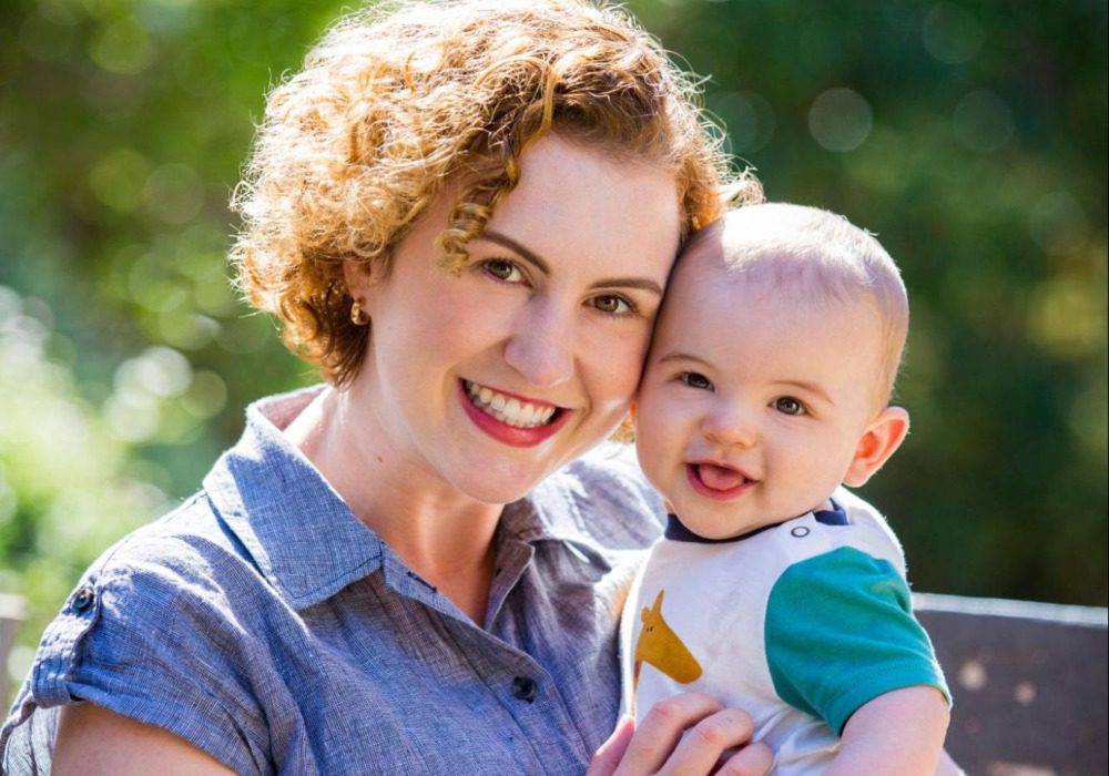 Picture book author Millie Lewis with baby